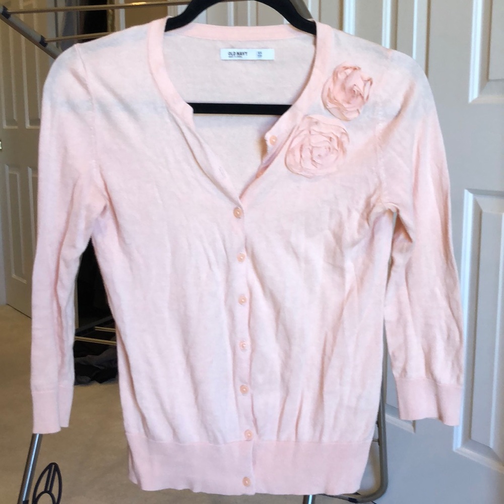 Peach cardigan with rosette detail